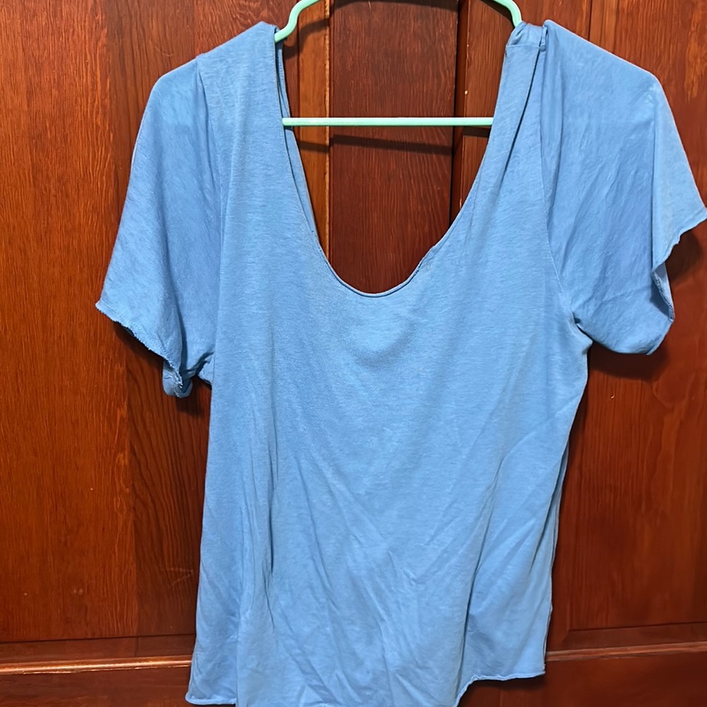 Blue shirt with open back
